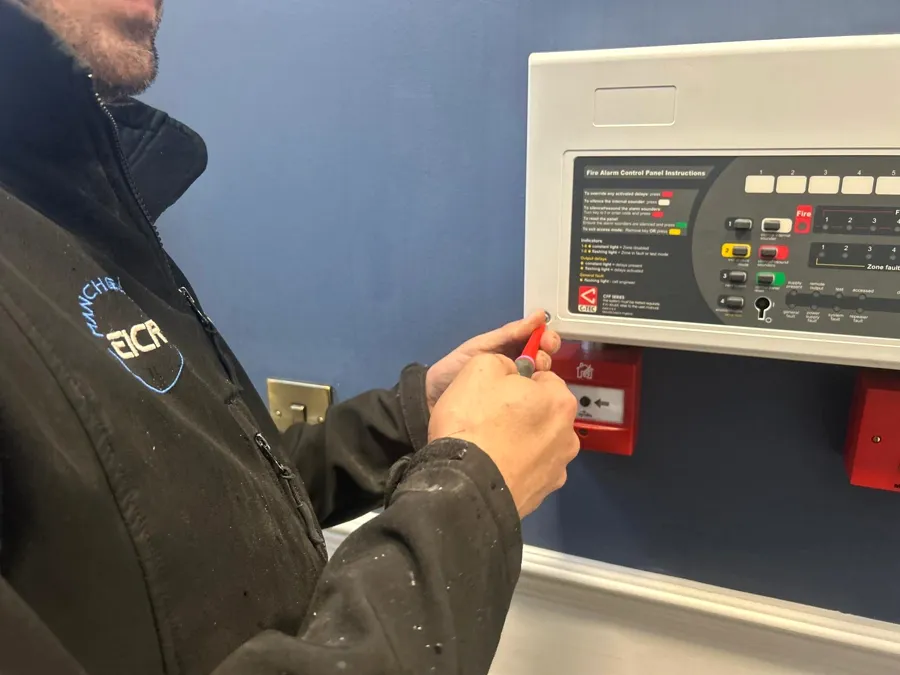 Servicing a fire alarm panel